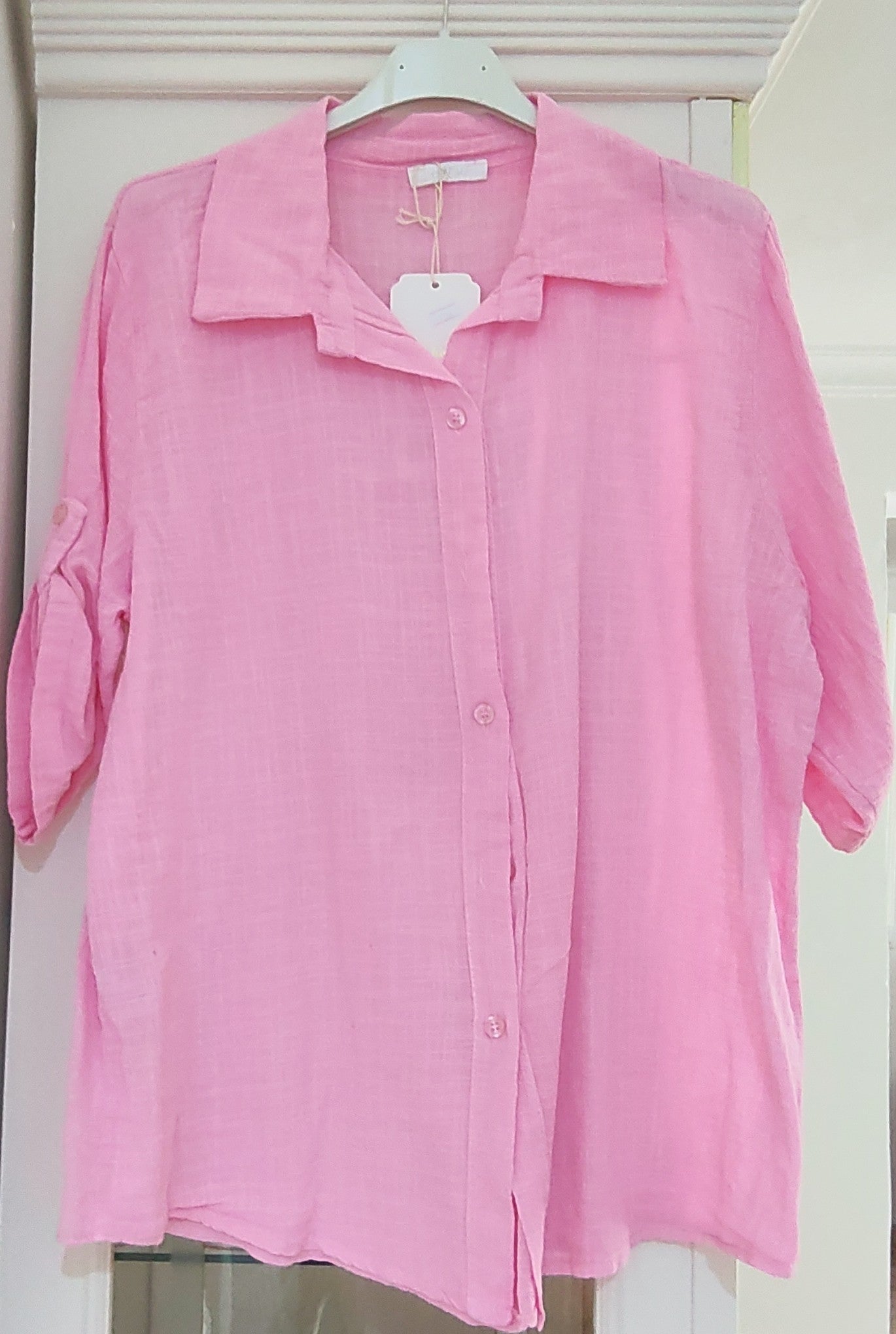 Camisa juvenil lino rosa tallas única manga corta 12'95 euros.