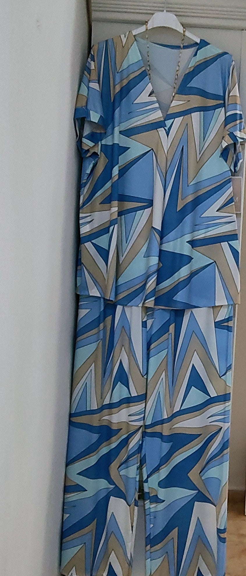 Conjunto de pantalón talla curvi  grande tejido seda fría,color celeste precio 25'50 .